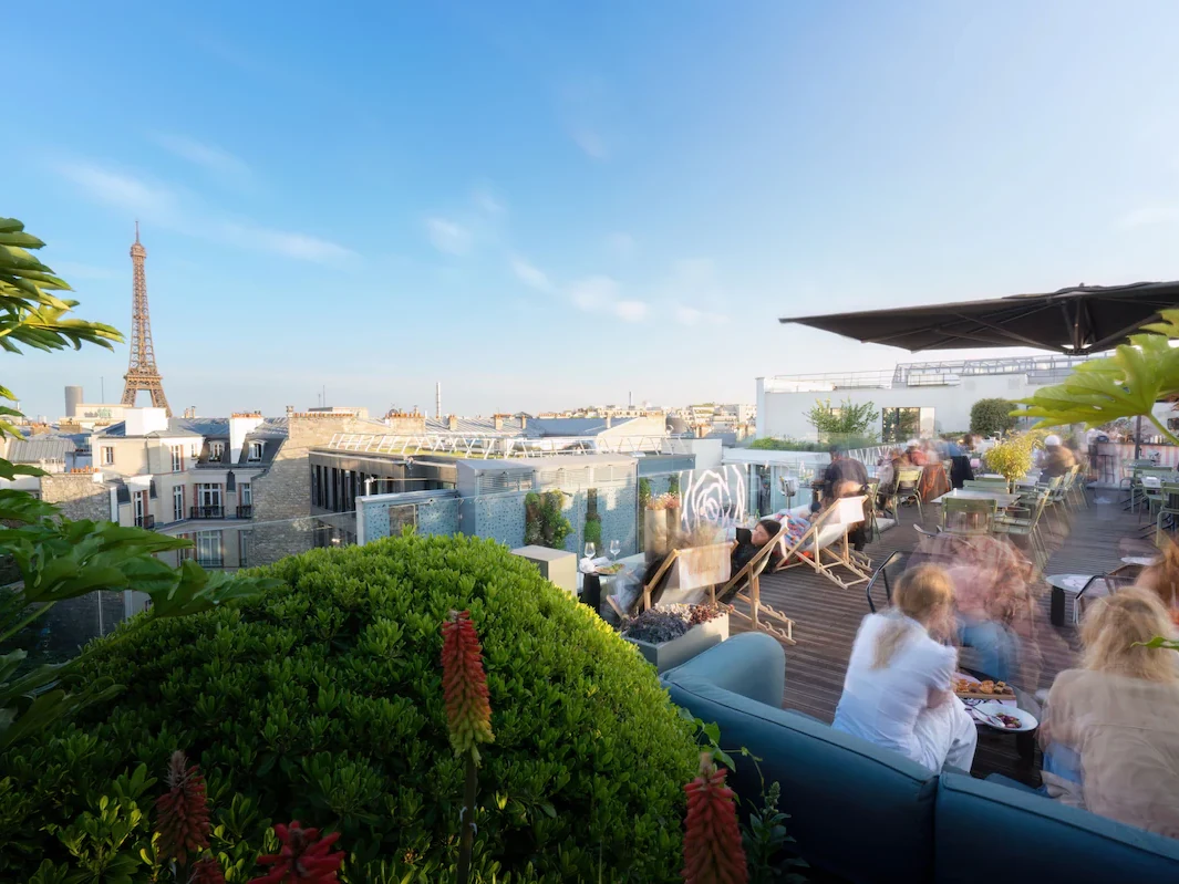 Shared rooftop terrace at Canopy by Hilton Paris with Eiffel Tower views